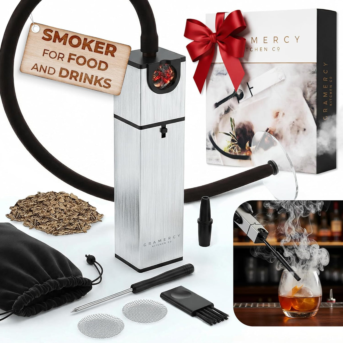 Complete cocktail smoker kit laid out with gift box, hose, chips and storage bag