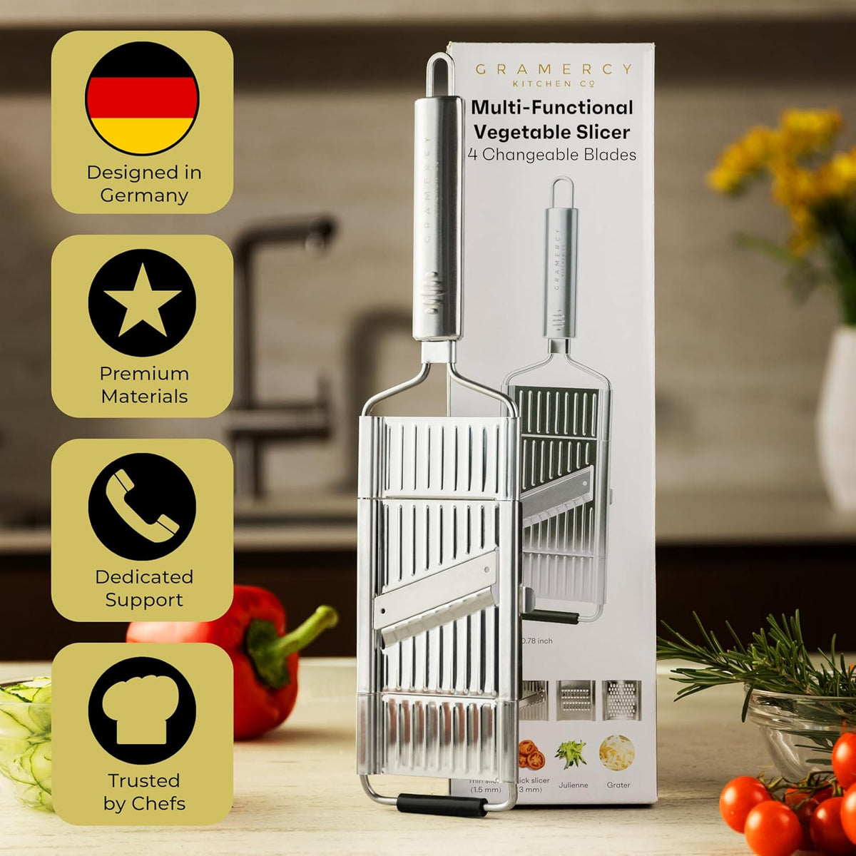 Handheld slicer beside its retail box with four brand marks