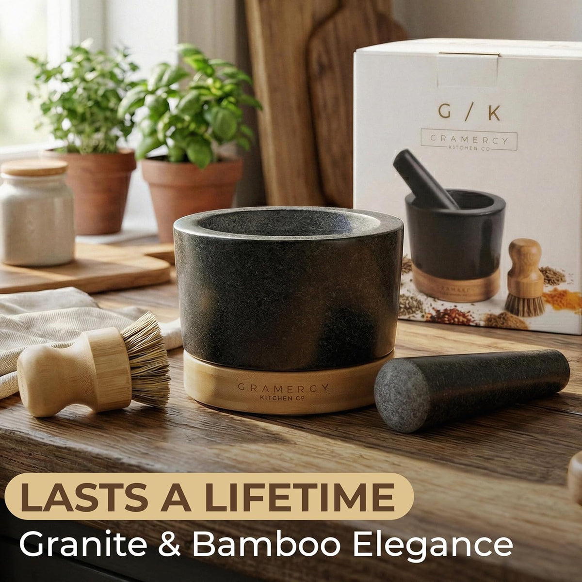 Granite mortar, pestle, bamboo base and brush laid out beside the gift box