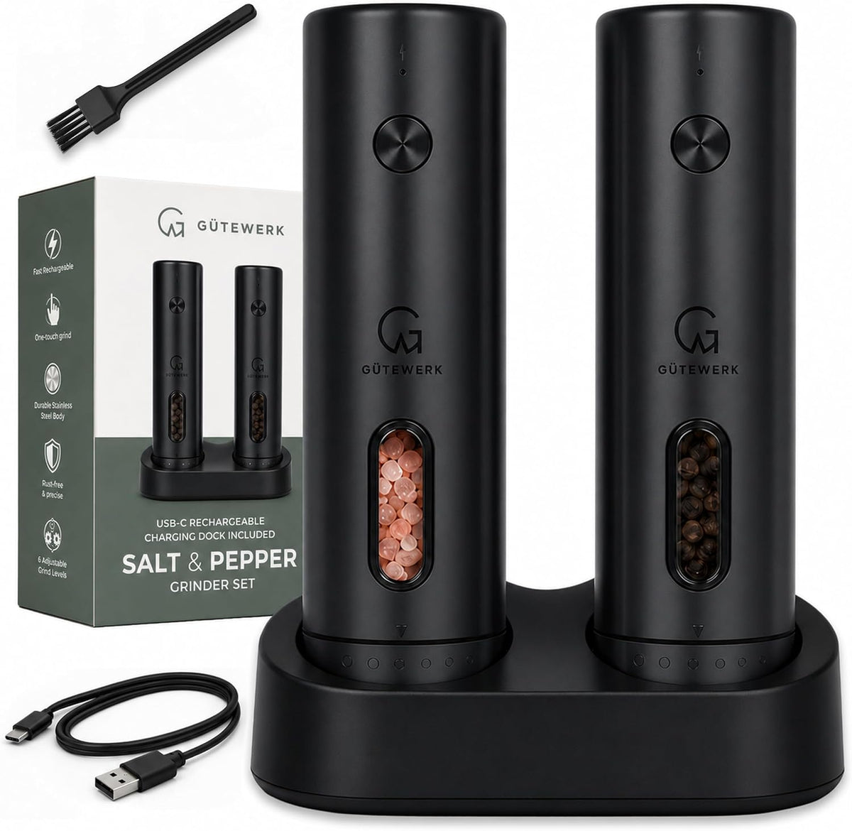 Black Gütewerk grinder set on its dock with retail box, USB-C cable and cleaning brush