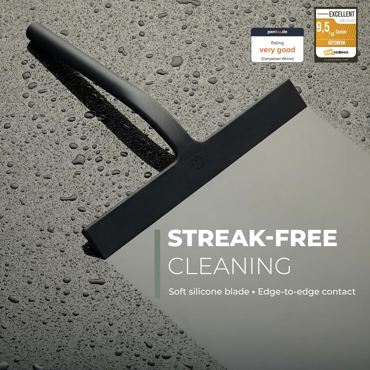 Black squeegee on wet glass with soft silicone blade making edge-to-edge contact
